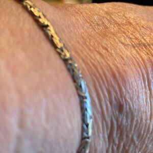 silver bracelet , adjustable chain closure